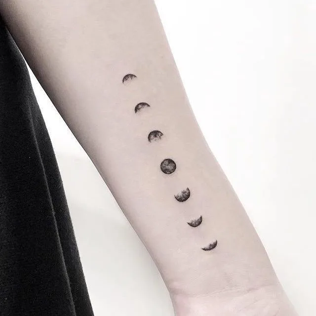 MOON PHASES SMALL ARM TATTOO