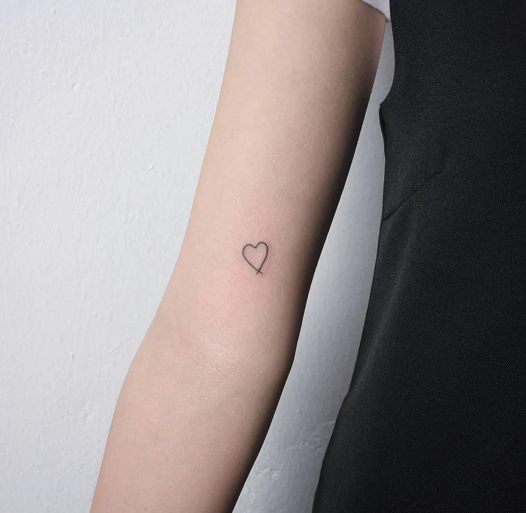 Minimalist Heart Small Arm Tattoo