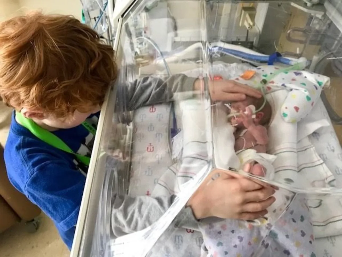 Because of Jake's condition, Mikey wasn't able to hold his brother after birth.