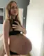 Maria's photos started going viral this week after she shared this most recent snap of her pregnancy bump at 35 weeks.-placeholder
