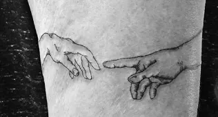 Michelangelo's 'Creation of Adam' Tattoo