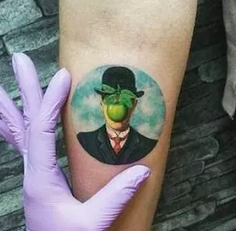Rene Magritte's 'The Son of Man' Tattoo