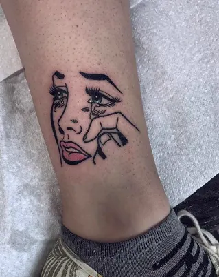 Roy Lichenstein's 'Crying Girl' Tattoo