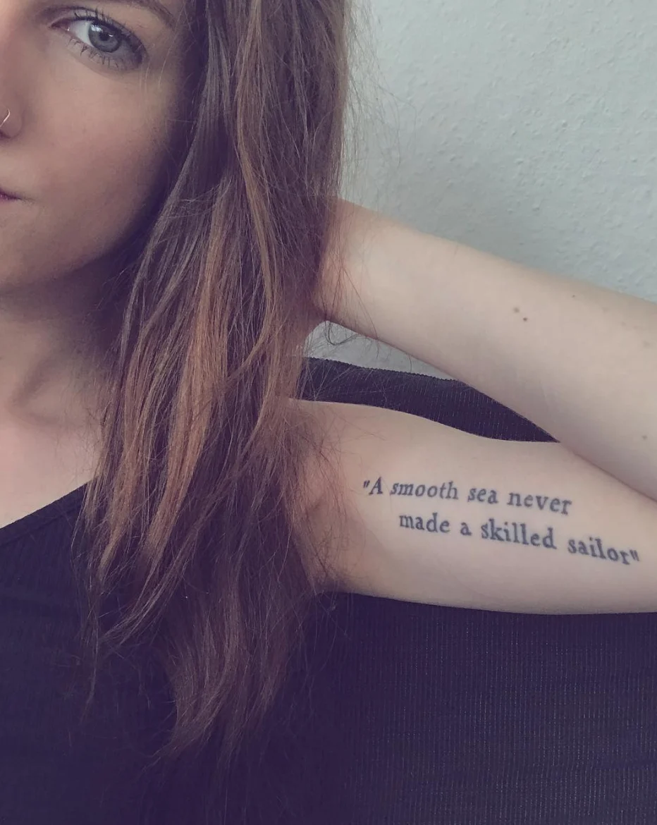 A Smooth Sea Never Made a Skilled Sailor Quote Tattoo