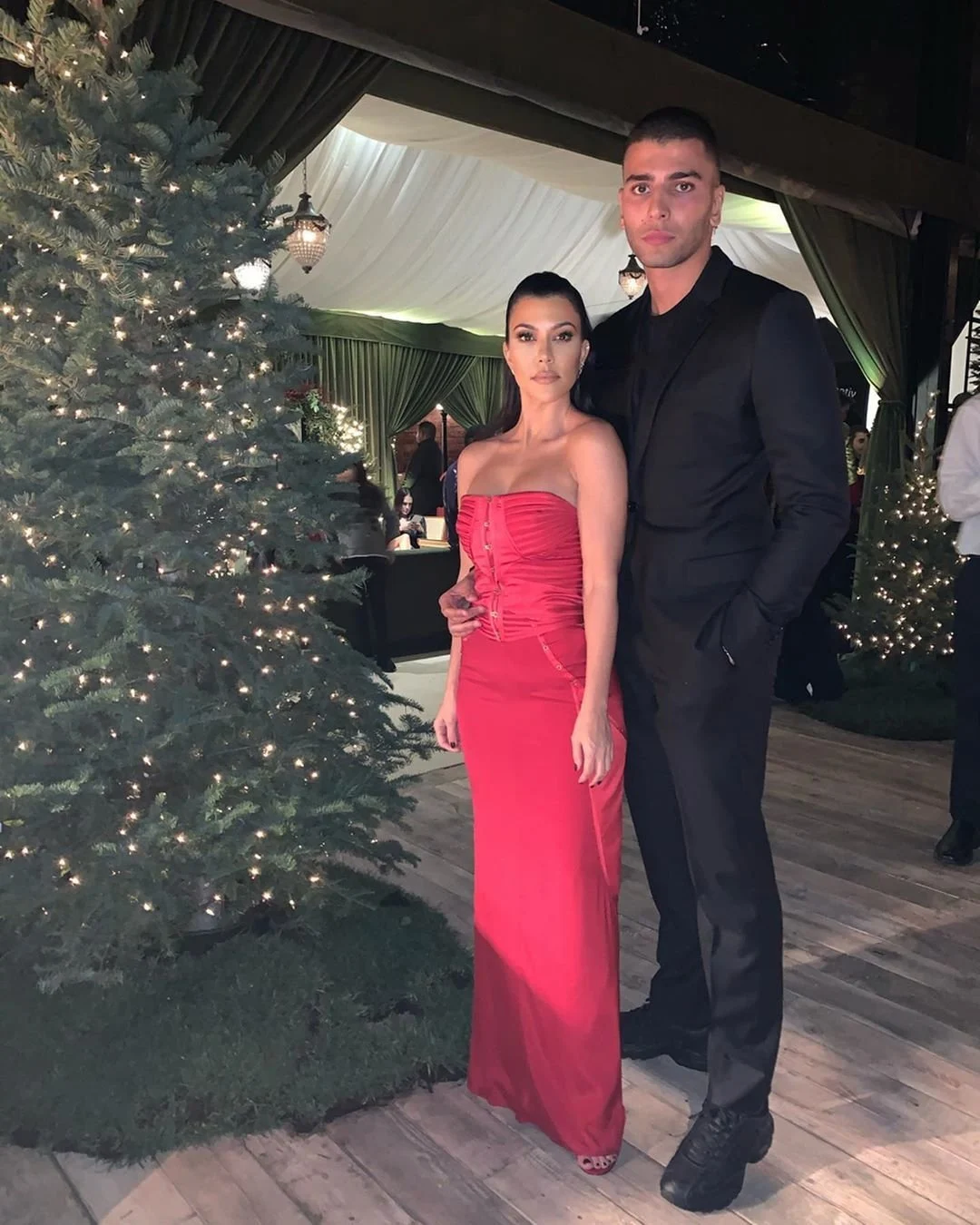 Kourtney just so happened to slide a photo with Younes in her post about this year's family Christmas party.
