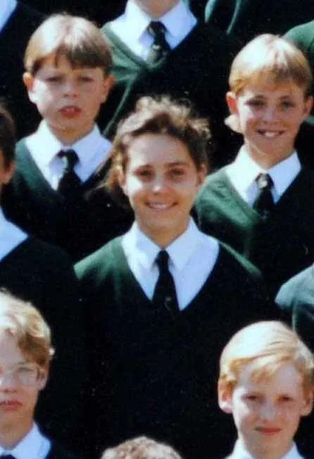 1990s: A Young Kate Watches Prince William Play Hockey