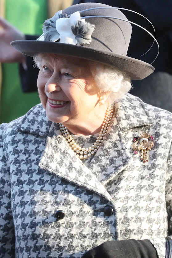 Queen Elizabeth wore a similar coat to Charlotte's dress earlier this year.