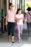 We're glad to see Katie and Suri are having fun together.-placeholder