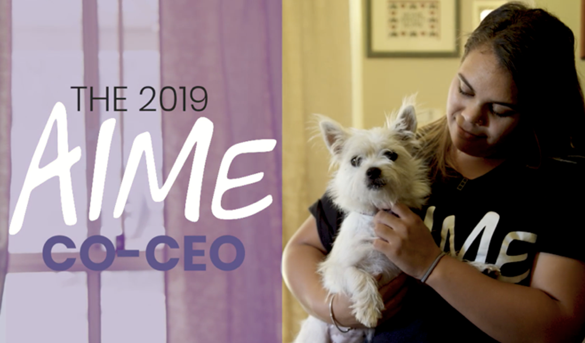 Sherice Jackson filming her Co-CEO video clip at her family home with her family pet, Cloud.