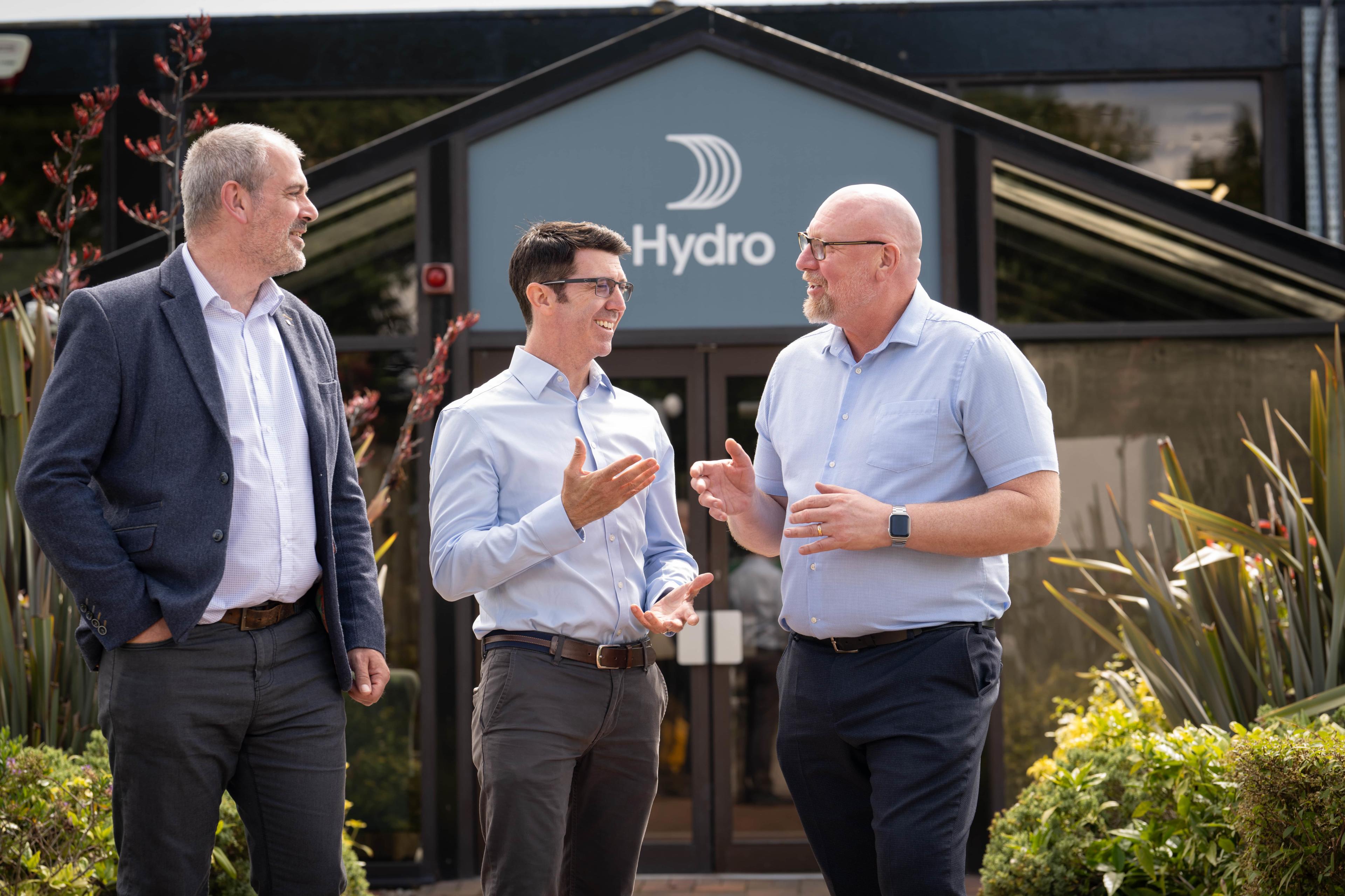 Roger Ablett, Country Managing Director, Hydro Extrusion UK; Greg Kavanagh, Head of Industrial & Commercial Sales; and Ian Bould, HSEQ and Sustainability Director, Hydro Extrusion UK, outside the Hydro Extrusions facility in Tibshelf