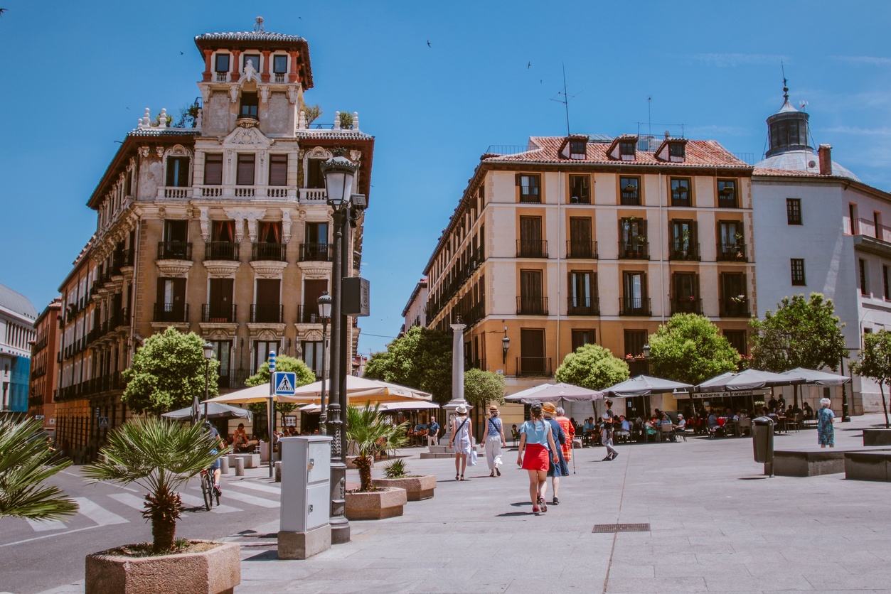 Young expat woman managing her online bank account in Barcelona, Spain