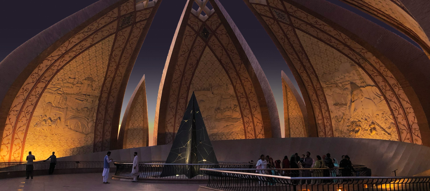 Image of the Pakistan Monument with Xe visual branding