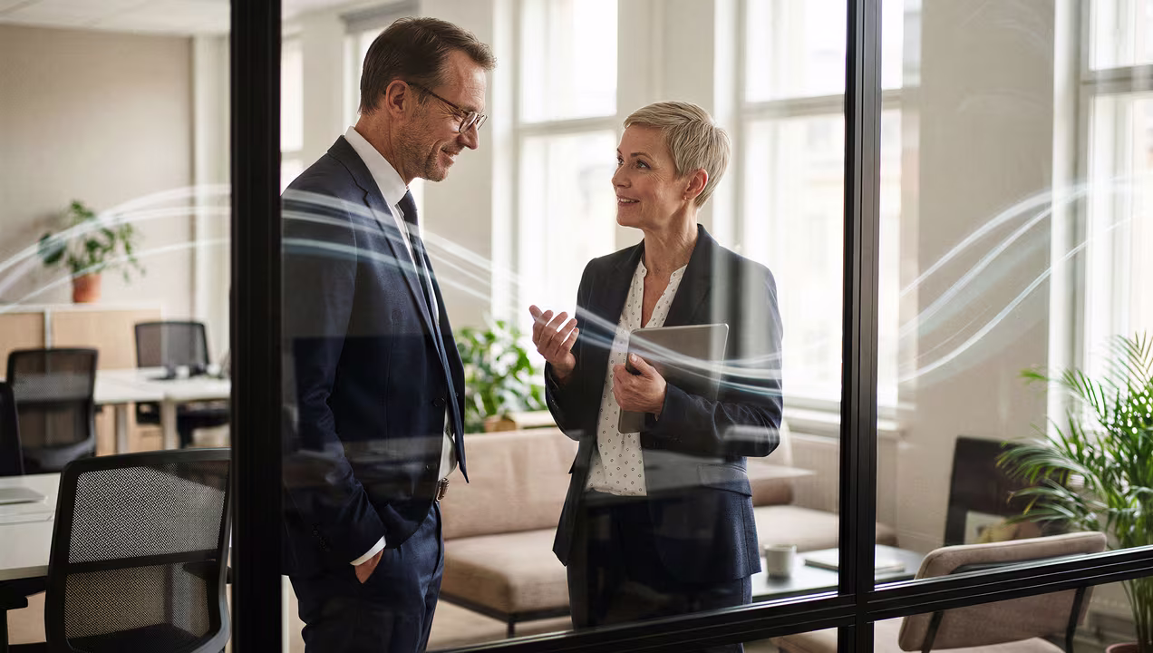 Two businesspeople having a discussion
