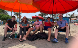 Five people at the beach