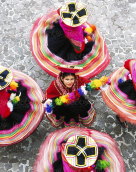 Women dancing in folk costumes