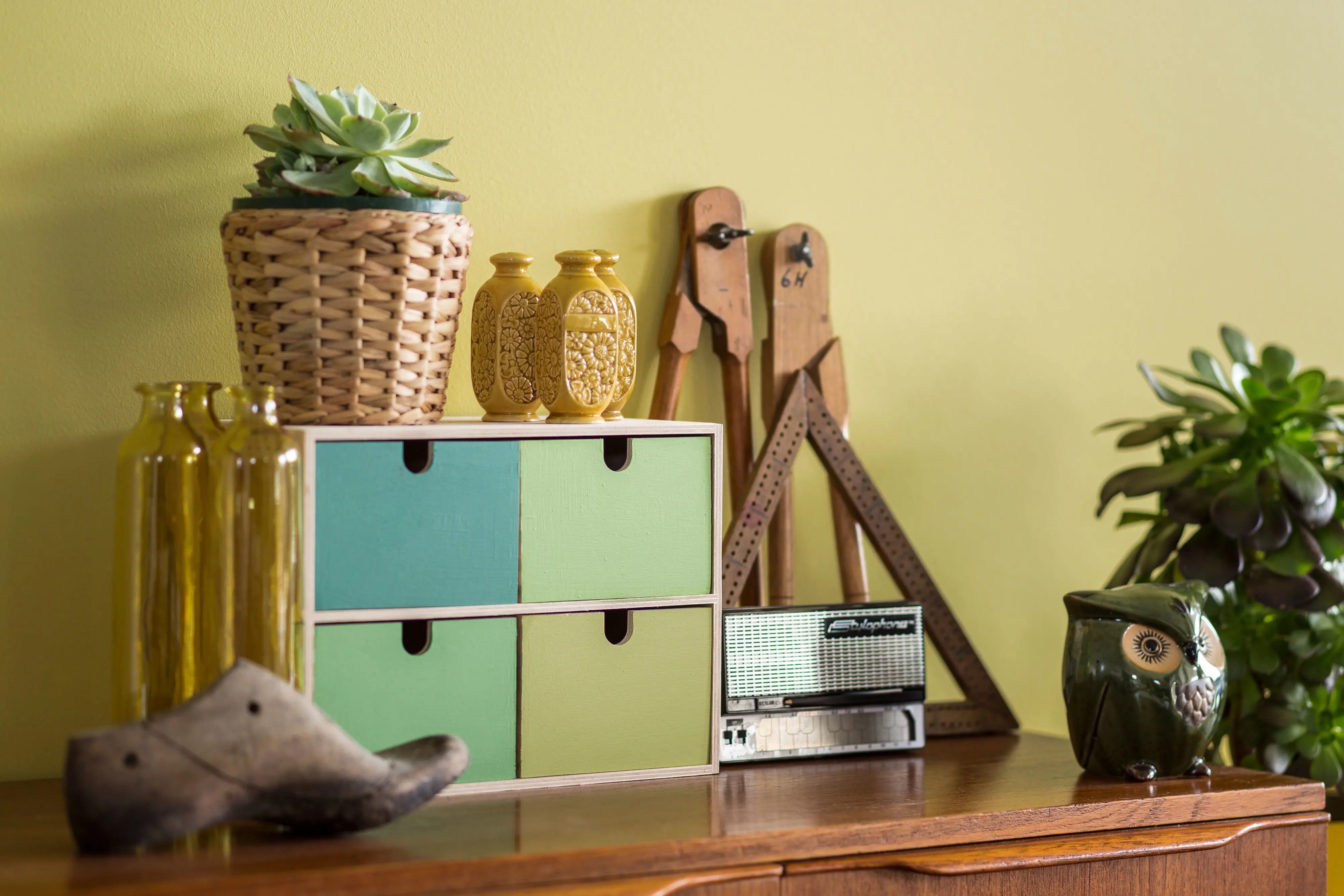 Green decor on timber console. Colour Forecast 2013 - Seek palette