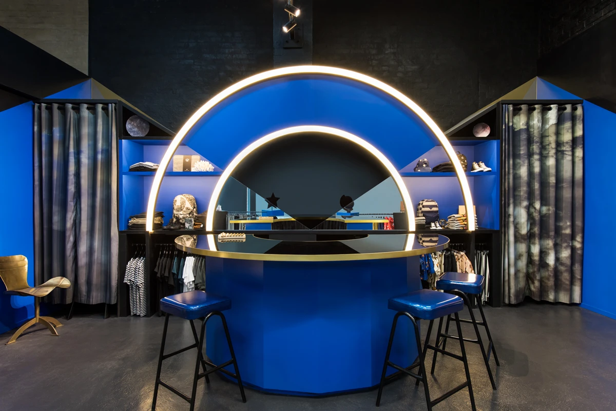 Blue semi-circle bar with stools.