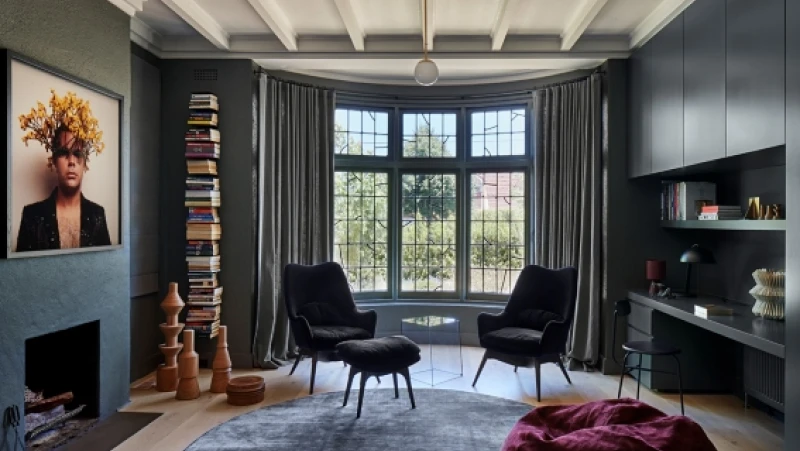 Blue-grey living room with leadlight bay window