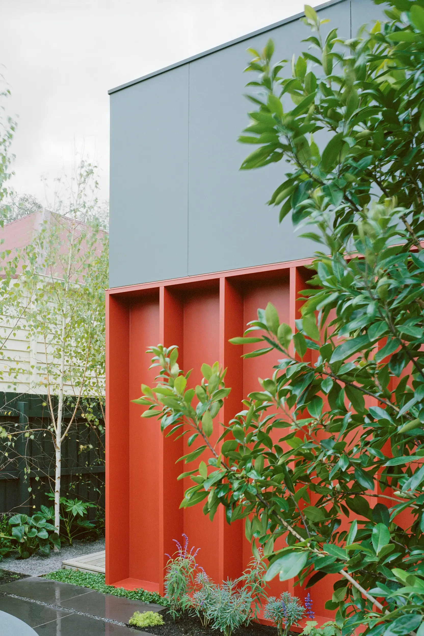 Grey and red house exterior