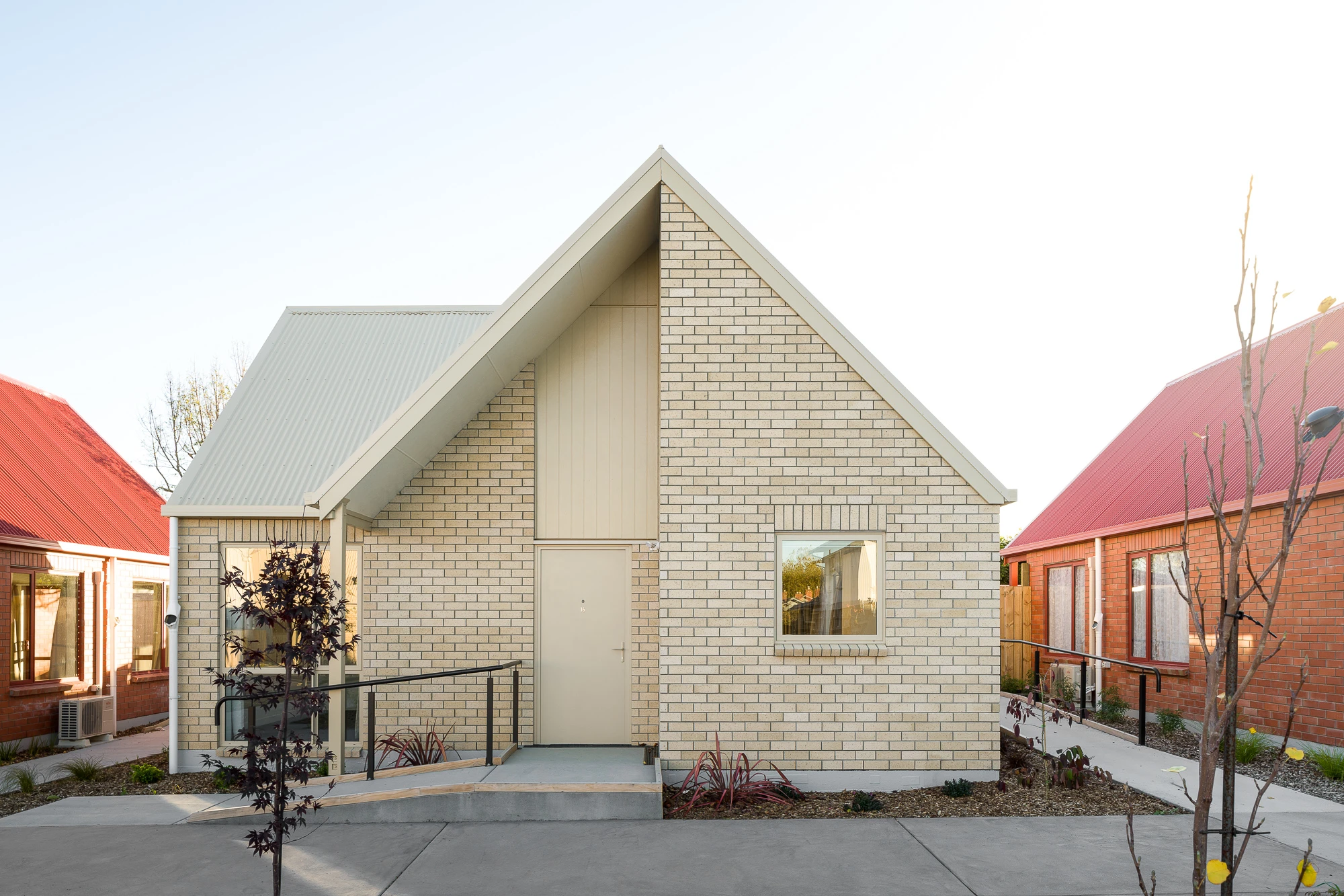 White brick house with white roof