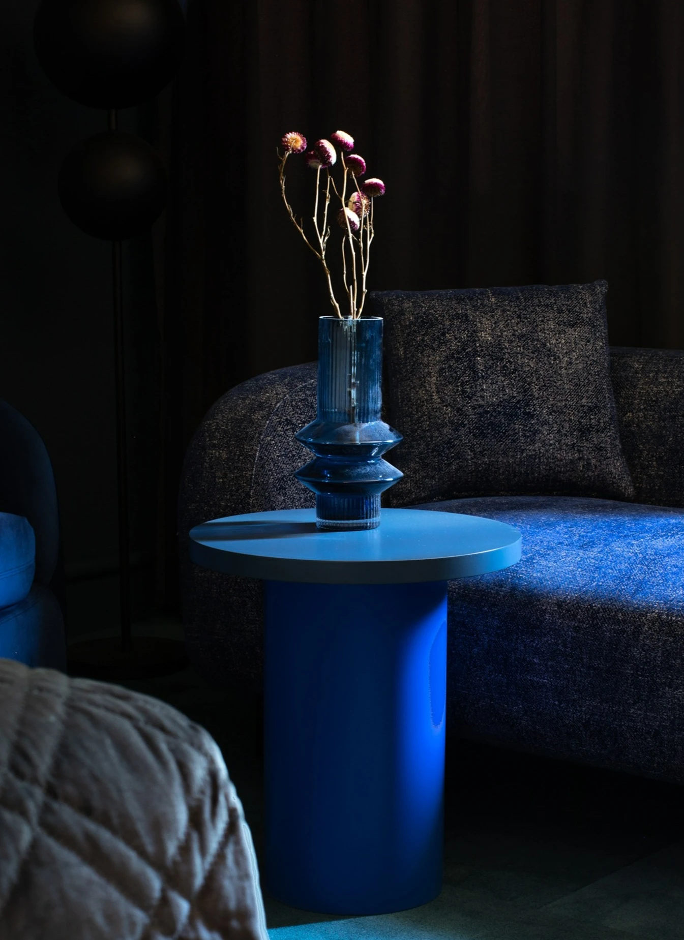 Blue table, vase and couch