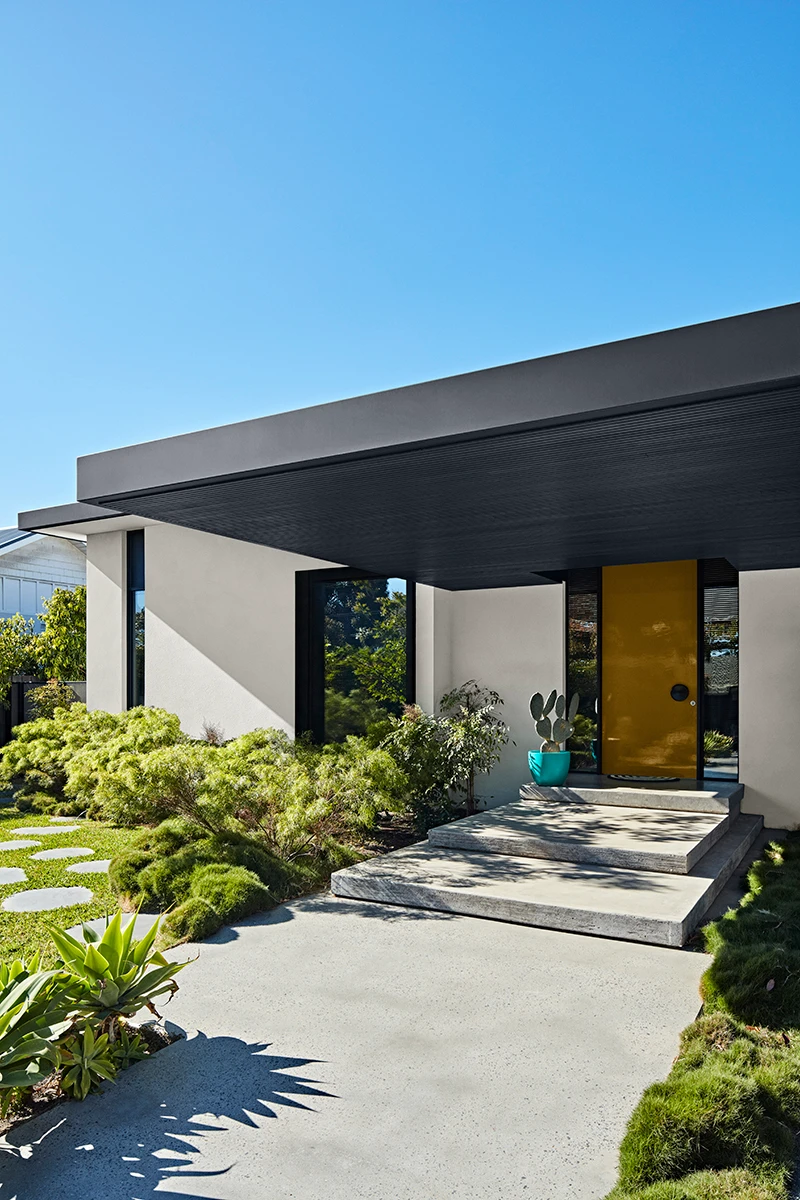 Modern Exterior house with Yellow Feature Door