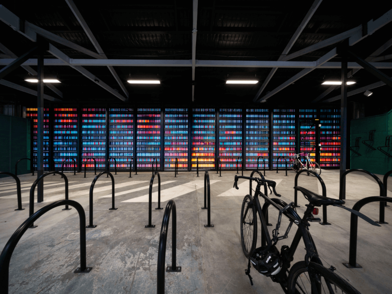 Colourful wall in bicycle storage area