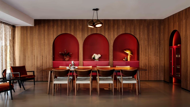 Timber meeting room with red accents