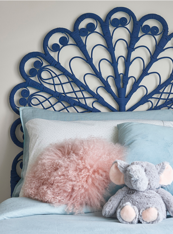 interior tween bedroom closeup on blue bed frame.