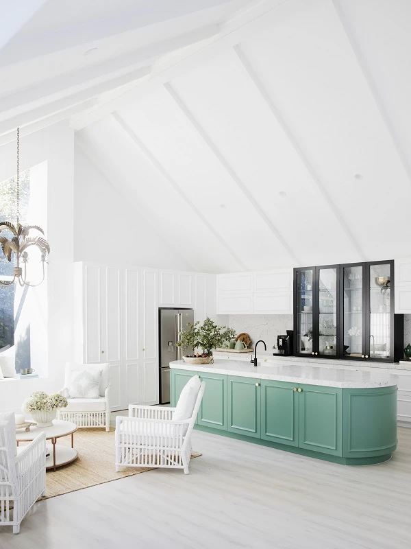 White kitchen with green bench