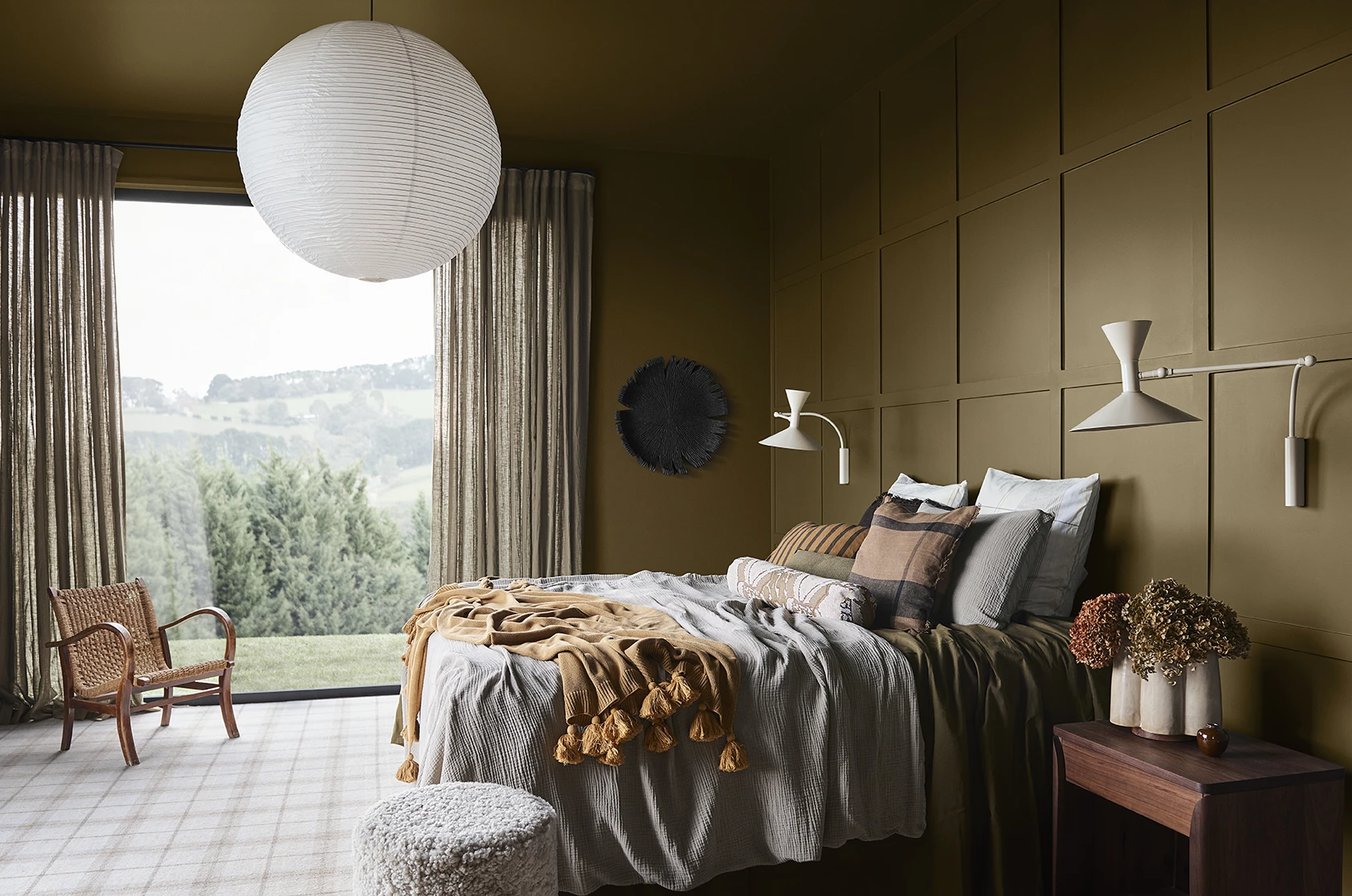 Khaki bedroom with grey linens