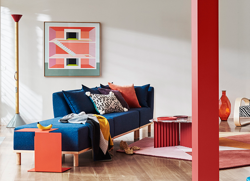 A navy sofa in a lounge room