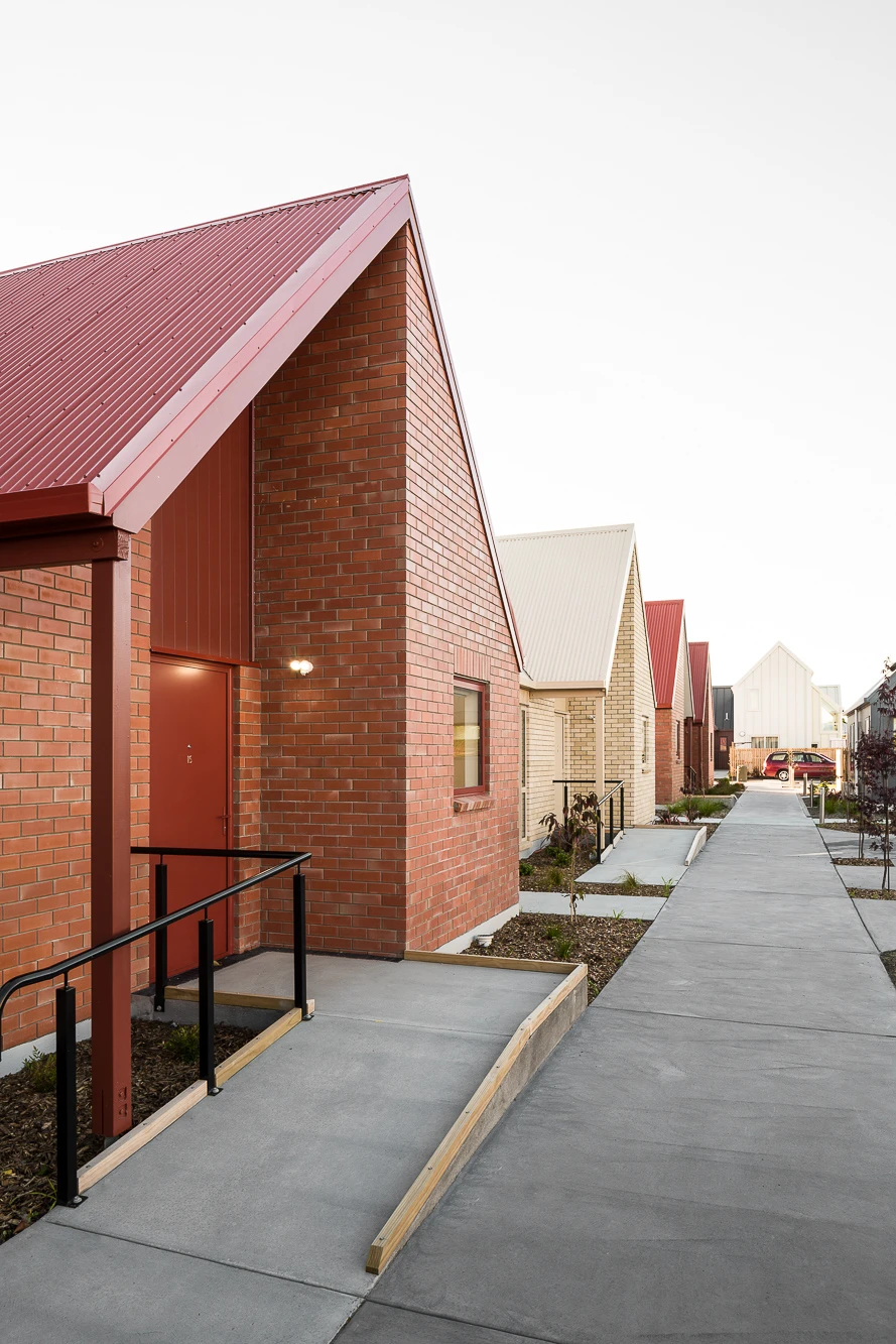 Red brick house with red roof