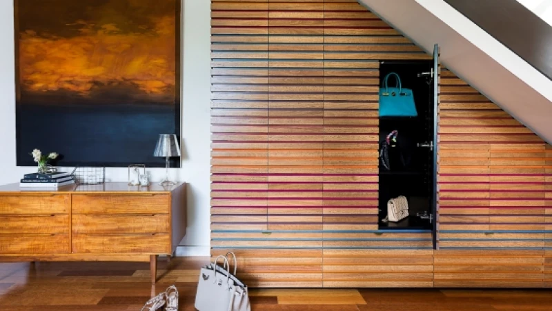 Wooden cupboards under stairs