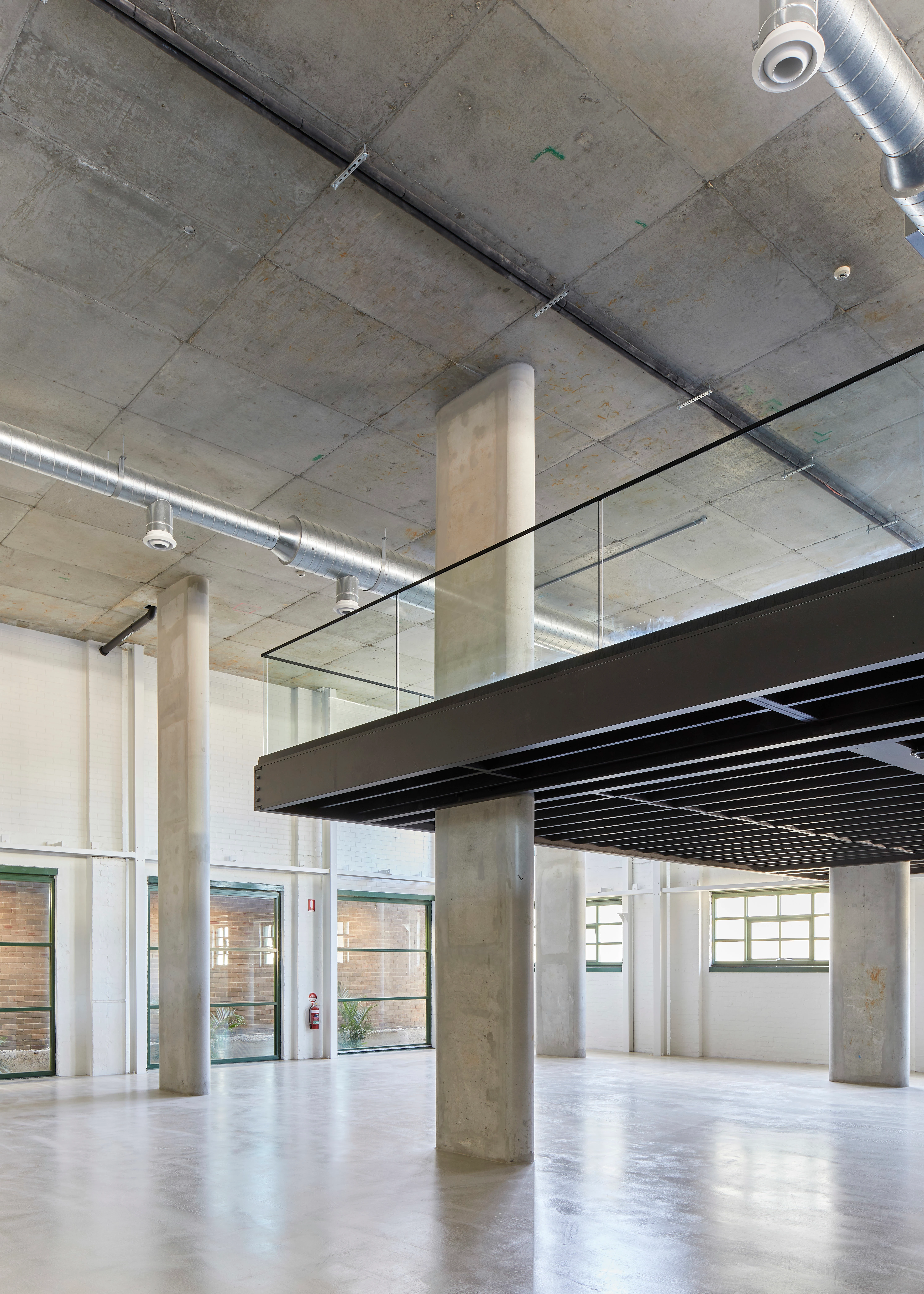 Interior viewing platform over polished concrete floor