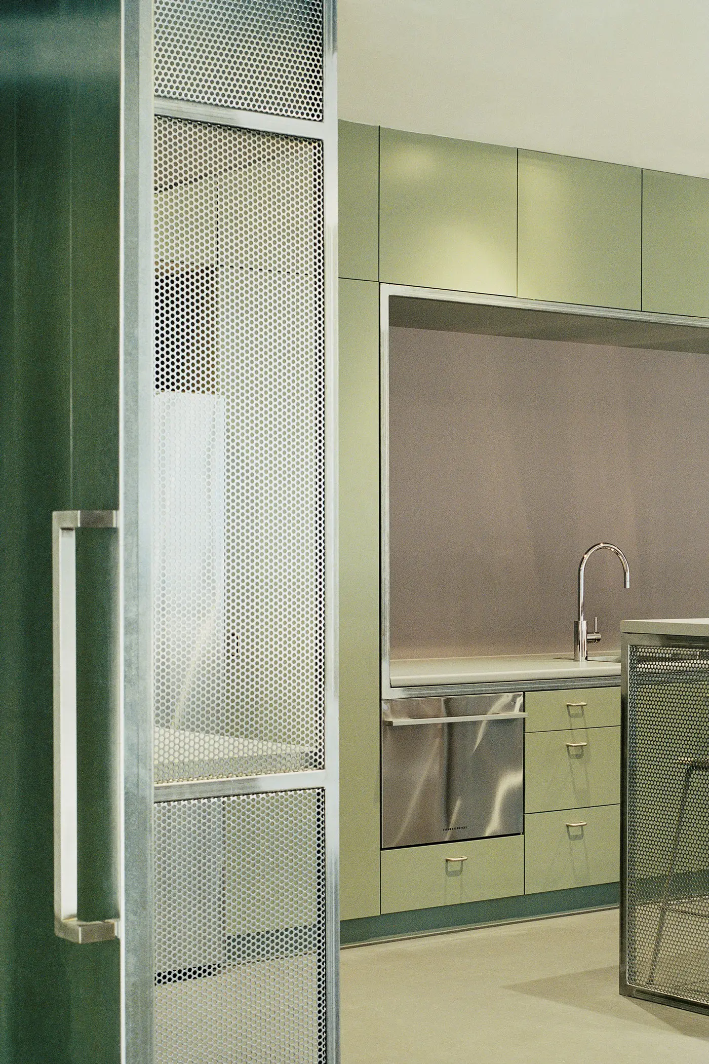 Green and white office kitchen