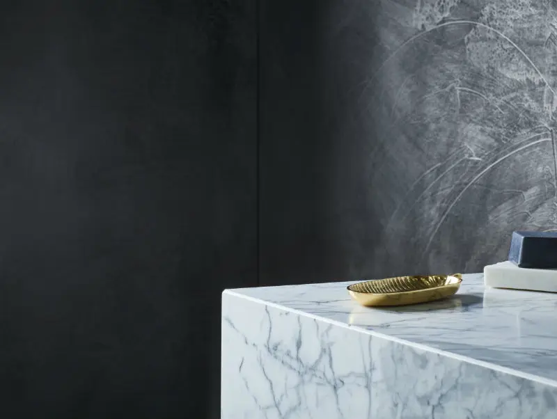 Concrete effect bathroom wall with marble vanity