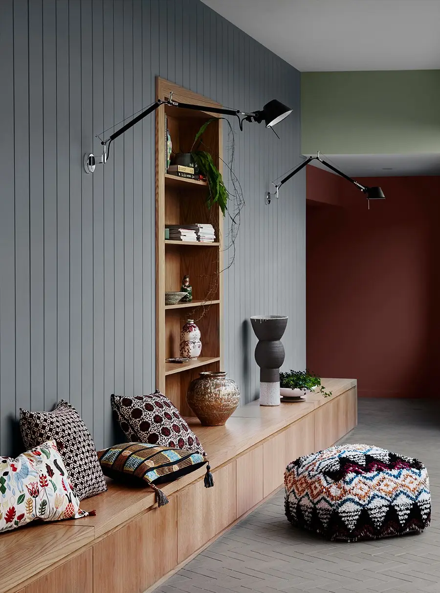 interior green hallway bench seat and shelf.