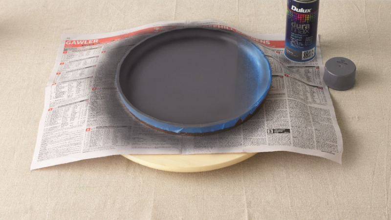 Mask the areas of your tray to stay unpainted with good quality painters tape.