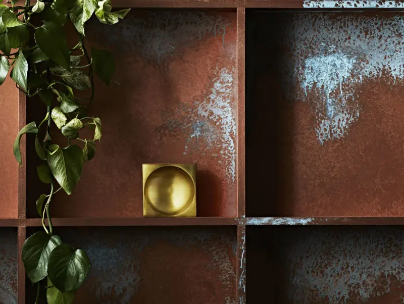 Bookcase painted in copper patina 