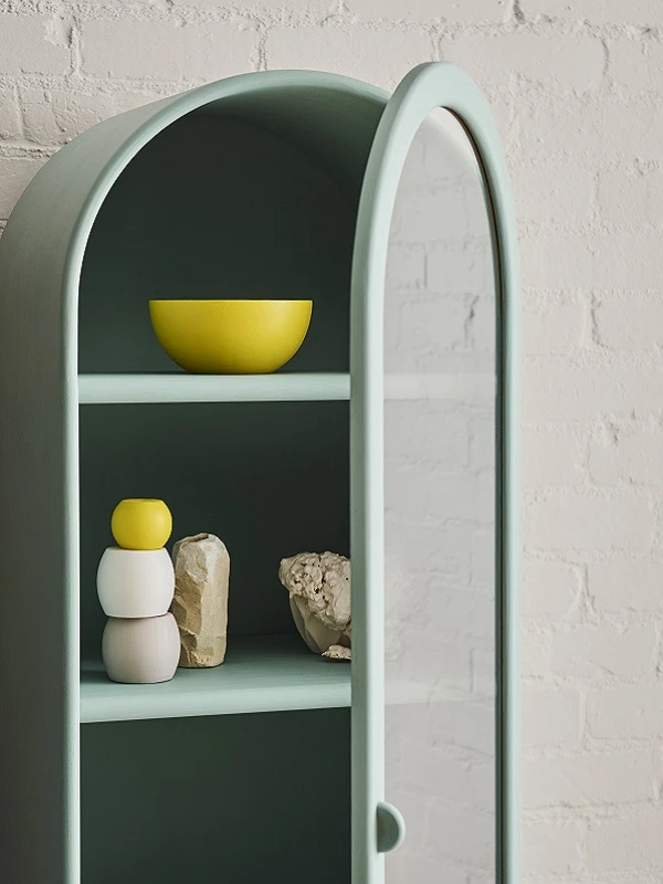 Interior green cabinet with yellow accents