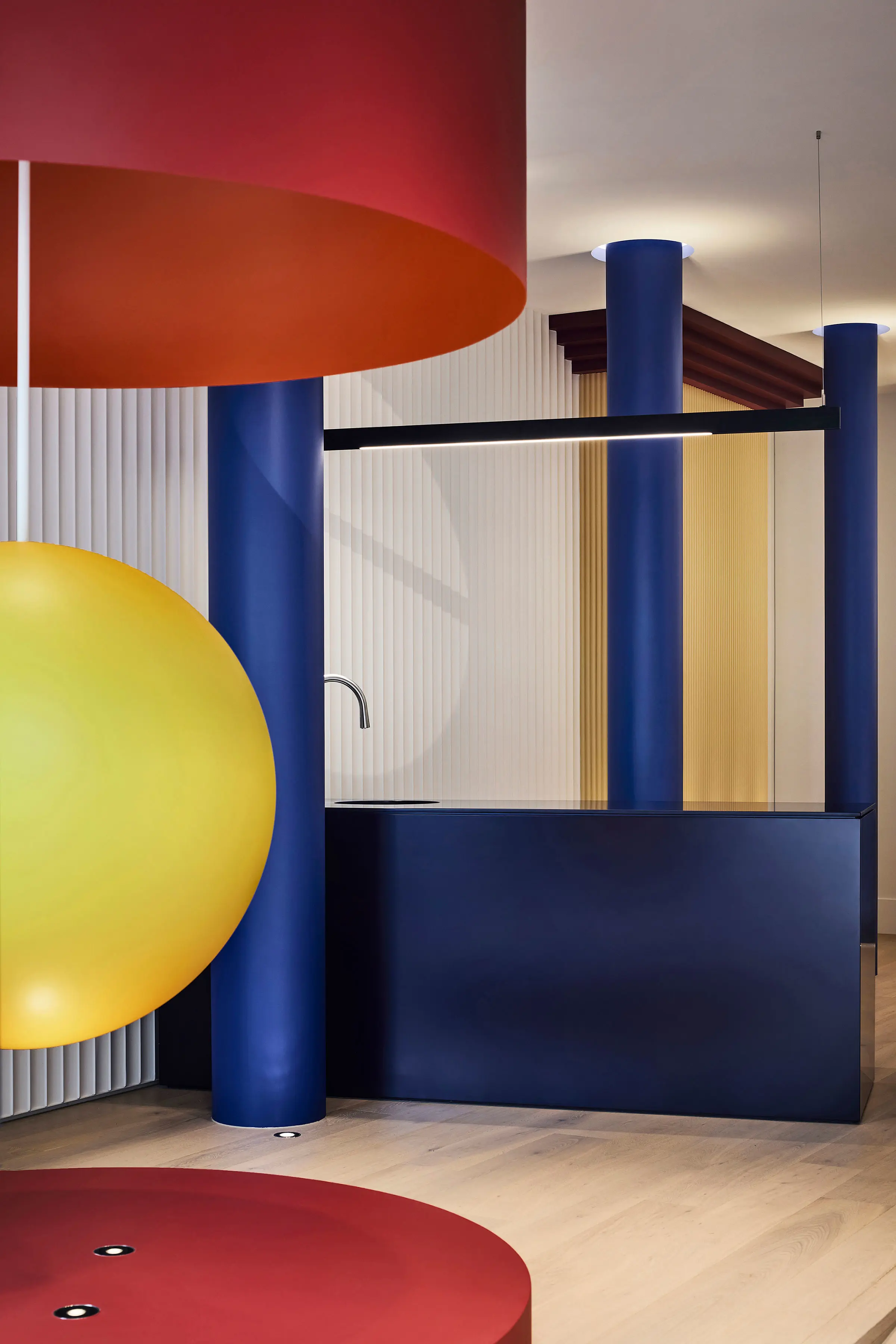 Red, blue and yellow colours used in shop fitout