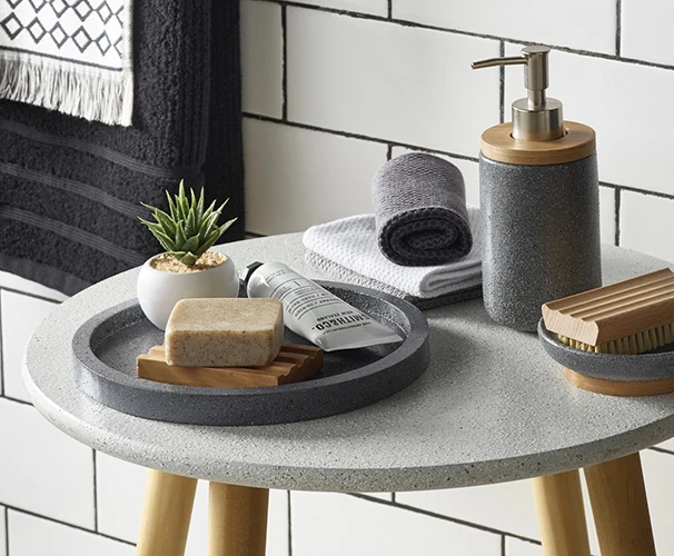 A side table in the bathroom featuring Duramax Granite Effect