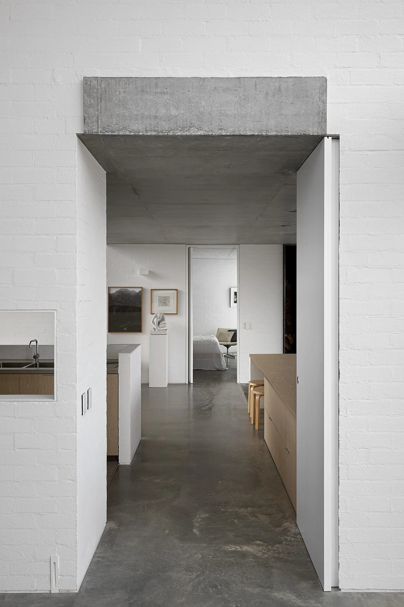 White interior with polished concrete floors