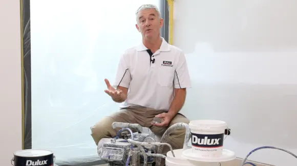 Man sitting with spray products