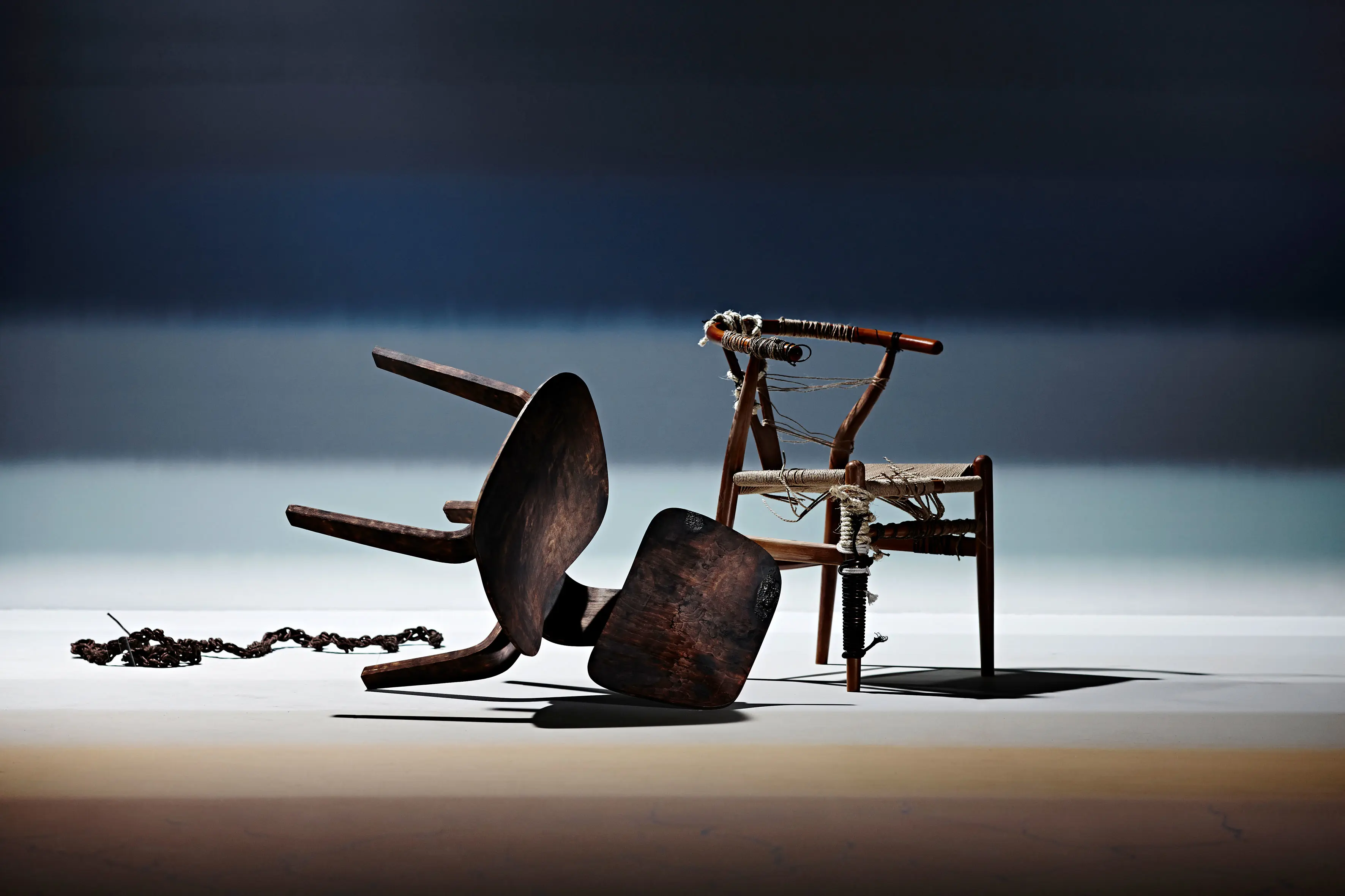 two chairs with blue and brown background