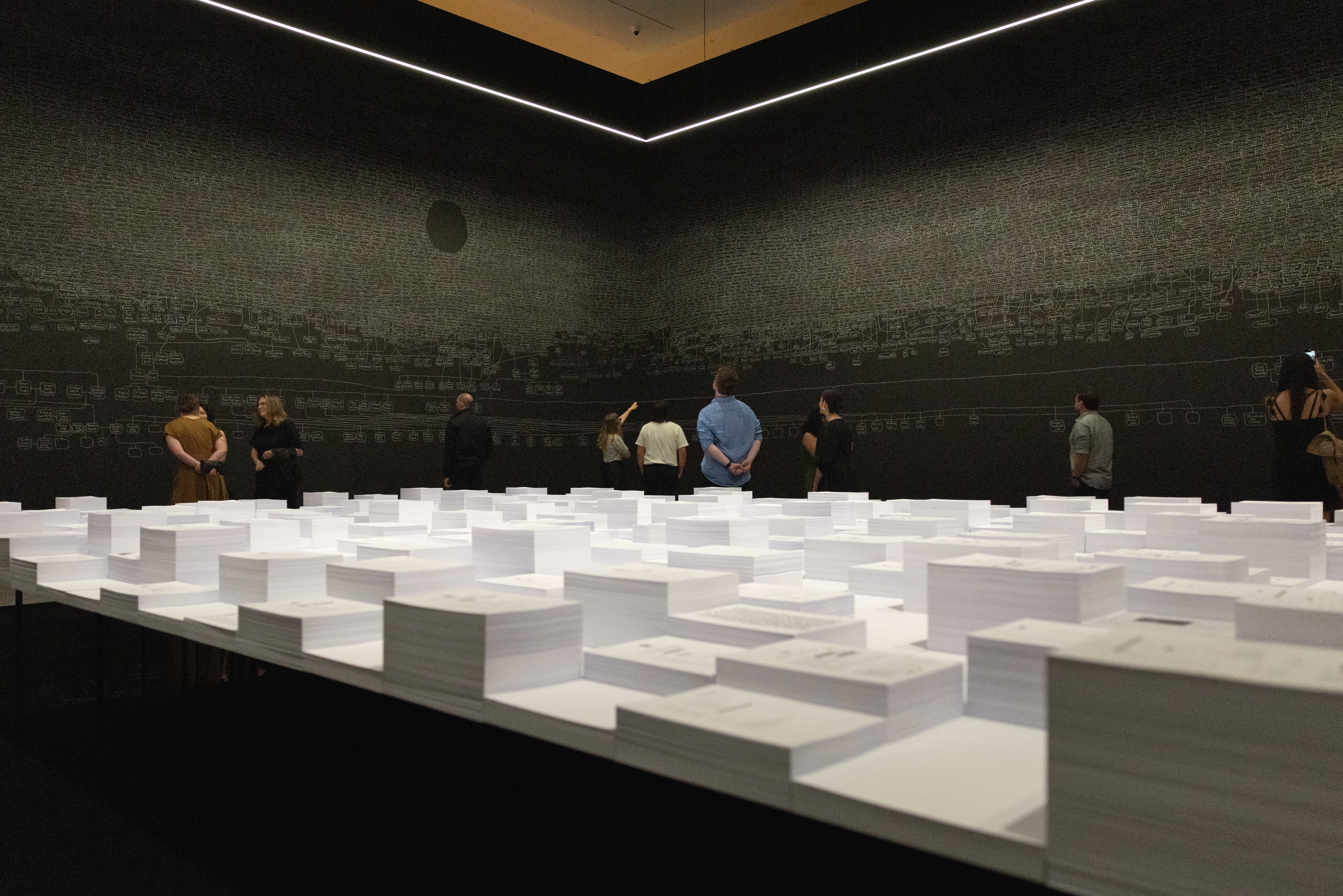 People viewing architecture models at the 2025 Dulux Study Tour Event 