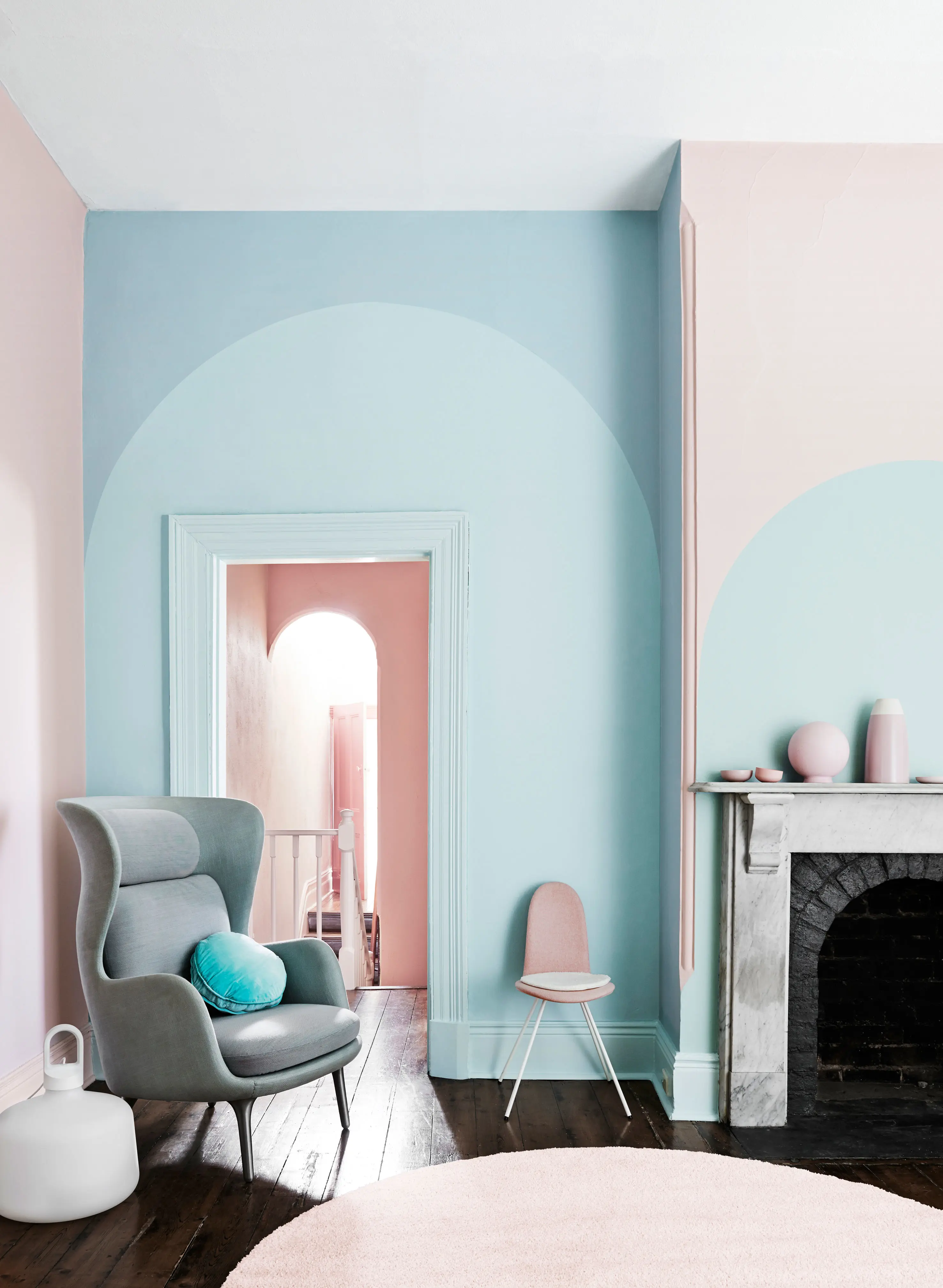 Pink and blue pastel traditional living room with fireplace