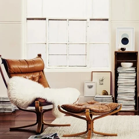 Scandi living room, white, soft furnishings, leather chair and footstool stool.