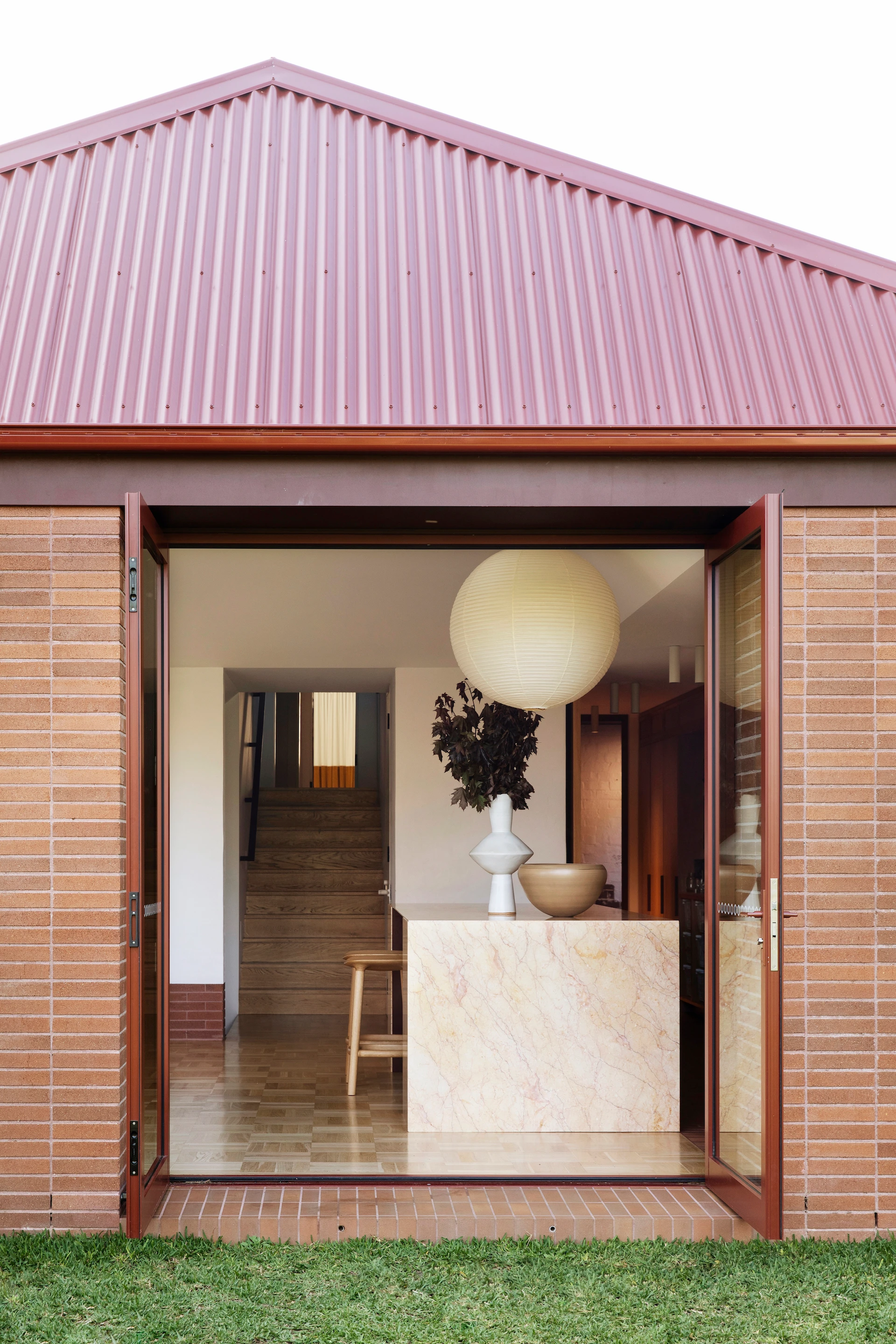 exterior brick house looking into kitchen